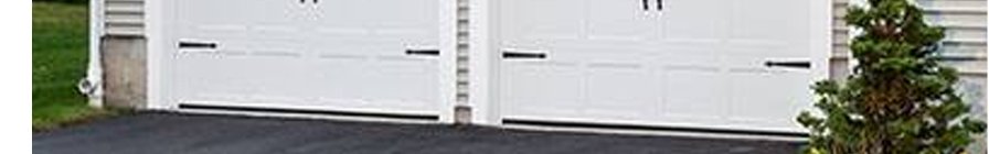Carriage house garage doors on a Santa Ana home, from Safeway Garage Doors own website